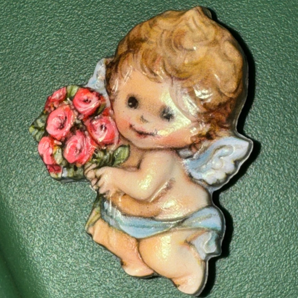 Cherubic Angel Brooch with Floral Bouquet hallmark